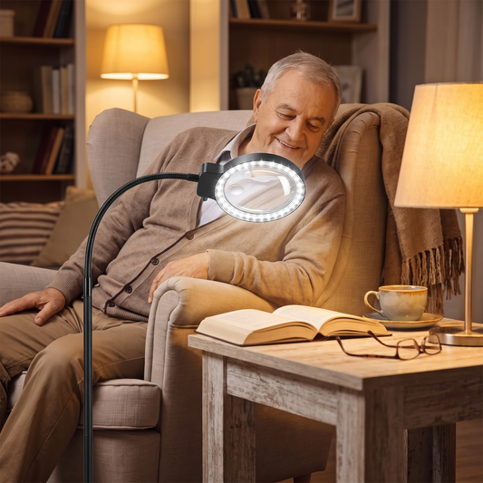 Full-page LED magnifier in use over a book