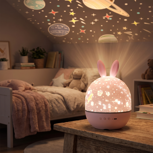 Star projector lighting a darkened bedroom